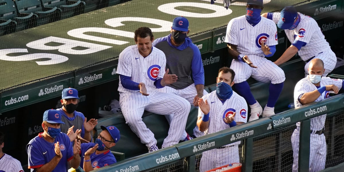 A Chicago Cubs spring training cap sits on the bench during the