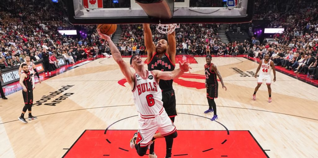 Alex Caruso of the Chicago Bulls goes for the layup