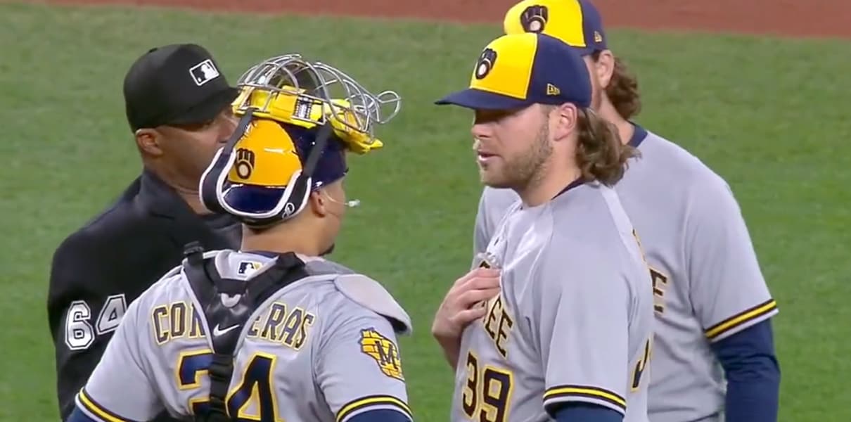 Corbin Burnes recovers from heat scare and strikes out 13 as