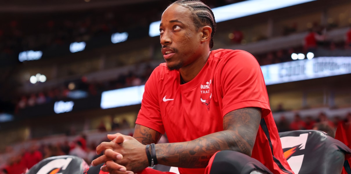 DeMar DeRozan sits on the bench for the Chicago Bulls.