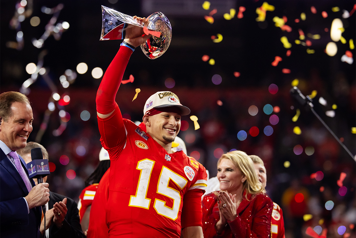 Feb 11, 2024; Paradise, Nevada, USA; Kansas City Chiefs quarterback Patrick Mahomes (15) celebrates with the Vince Lombardi Trophy after defeating the San Francisco 49ers in overtime of Super Bowl LVIII at Allegiant Stadium. Mandatory Credit: Mark J. Rebilas-USA TODAY Sports
