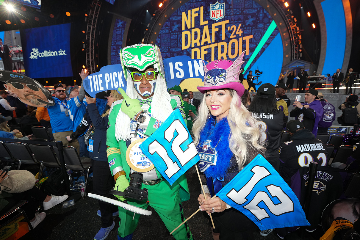 Apr 25, 2024; Detroit, MI, USA; Seattle Seahawks fans pose for a photograph during the 2024 NFL Draft at Campus Martius Park and Hart Plaza. Mandatory Credit: Kirby Lee-USA TODAY Sports