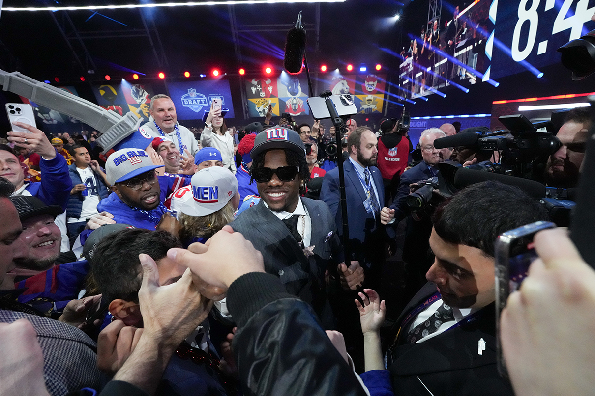 Apr 25, 2024; Detroit, MI, USA; LSU Tigers wide receiver Malik Nabers poses with fans after being selected by the New York Giants as the No. 6 pick in the first round of the 2024 NFL Draft at Campus Martius Park and Hart Plaza. Mandatory Credit: Kirby Lee-USA TODAY Sports